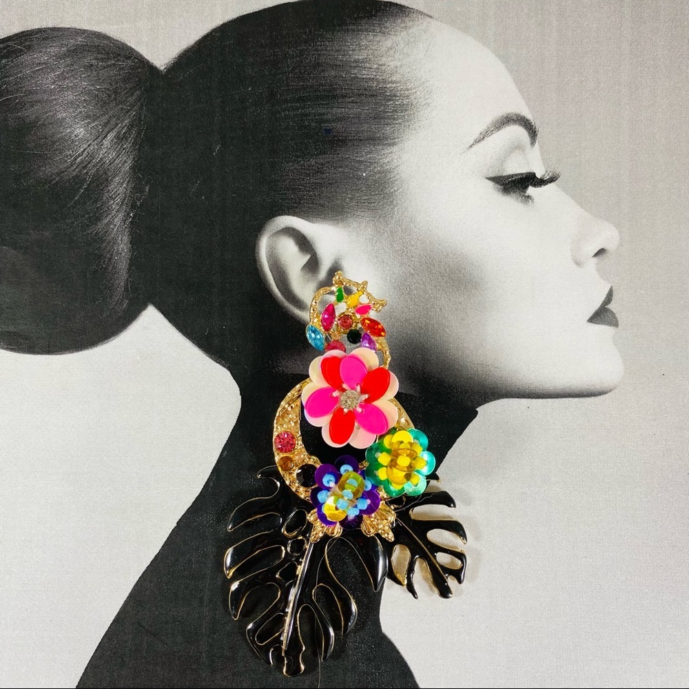 Black Monstera leaves and floralsBright sequins and rhinestone flowers…